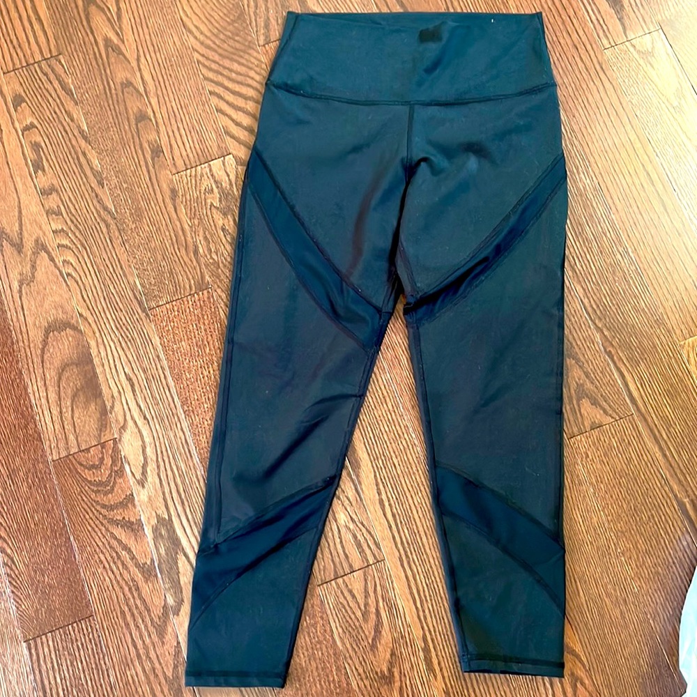 Aerie large black leggings with sheer stripe on thigh.